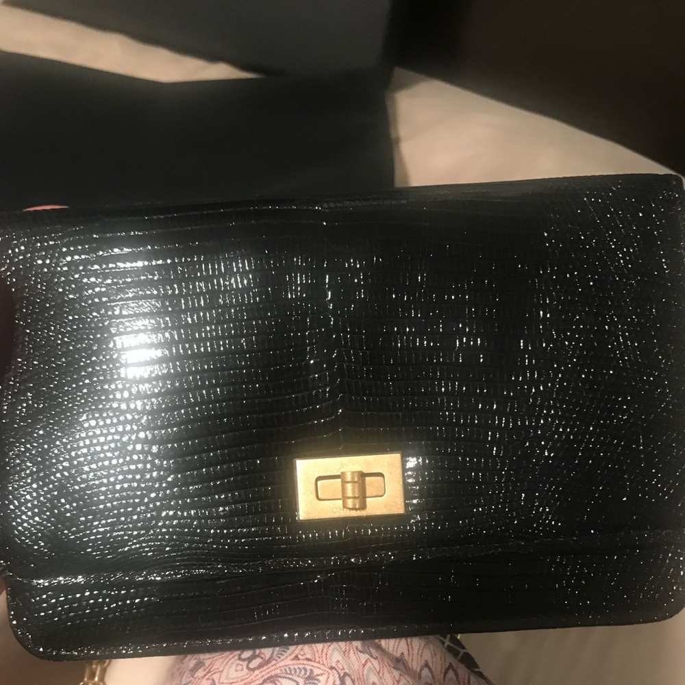 Authentic Chanel lizard woc. New with tags & box